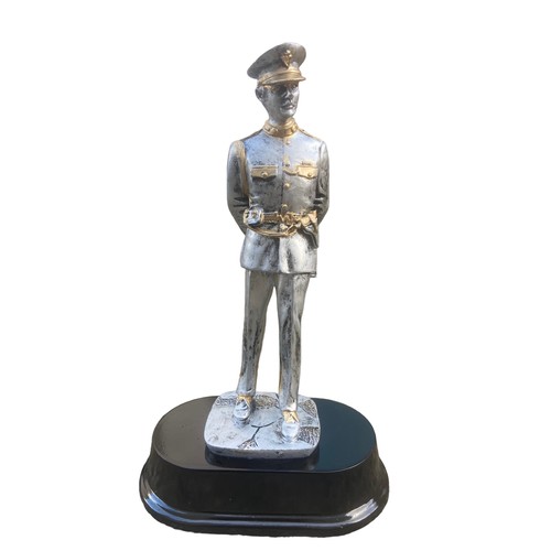 62 - A SILVERED & GILT FINISHED R.U.C FIGURINE ON PLINTH 10