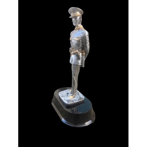 62 - A SILVERED & GILT FINISHED R.U.C FIGURINE ON PLINTH 10