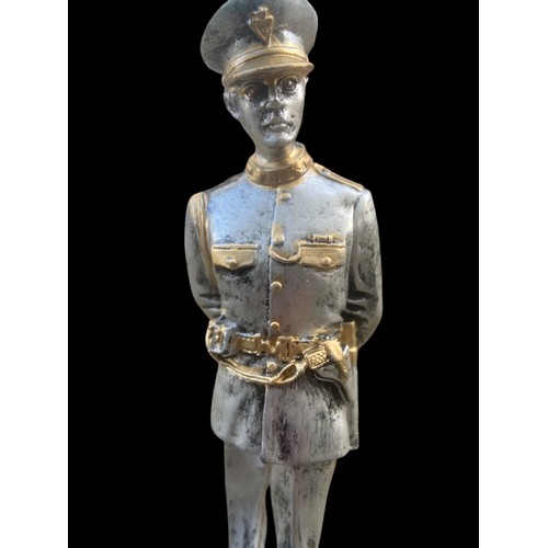 62 - A SILVERED & GILT FINISHED R.U.C FIGURINE ON PLINTH 10