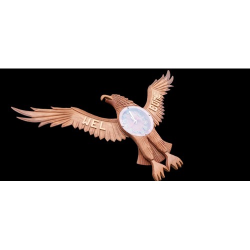 67 - A CARVED WOODEN AMERICAN BALD EAGLE CLOCK 26