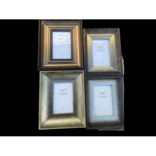 101 - A LOT OF 9 NEW MIXED PHOTO FRAMES