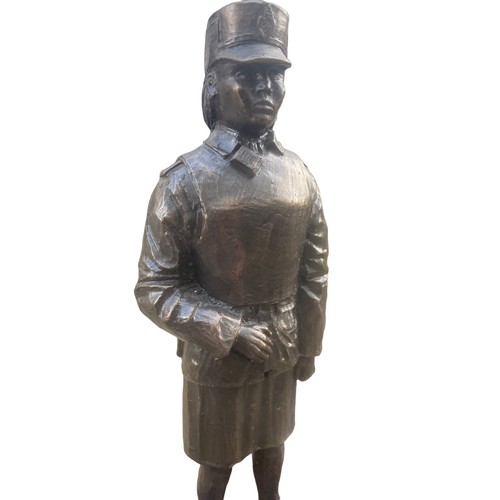 136 - A BRONZED FEMALE POLICE OFFICER 10