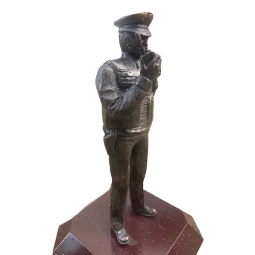 166 - A BRONZED FINISHED R.U.C OFFICER 11