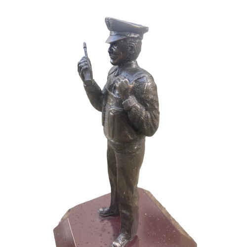 166 - A BRONZED FINISHED R.U.C OFFICER 11