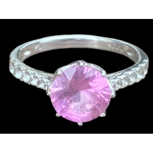 218 - A SILVER PINK STONE RING