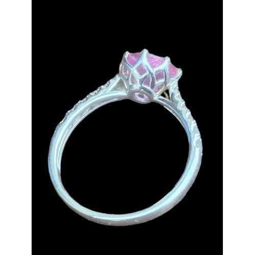 218 - A SILVER PINK STONE RING