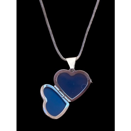 234 - A SILVER HEART LOCKET WITH SILVER CHAIN