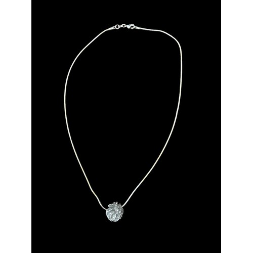 238 - A SILVER MARCASITE PENDANT ON A SILVER CHAIN