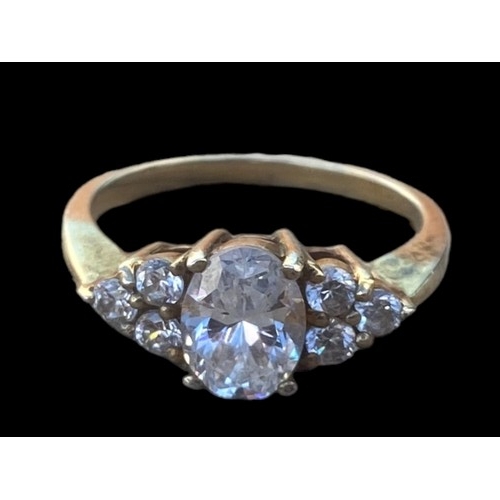 241 - A SILVER GILT 7 STONE RING (SIZE P)