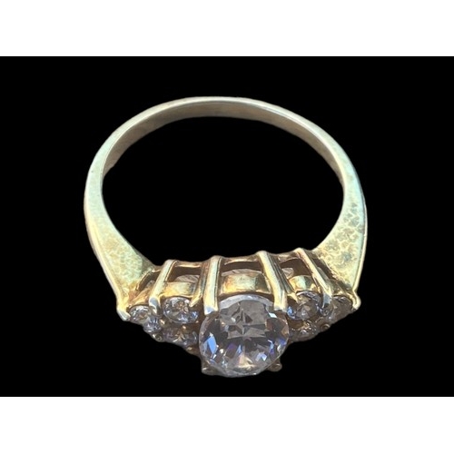 241 - A SILVER GILT 7 STONE RING (SIZE P)