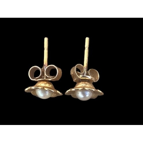 242 - A PAIR OF 9ct GOLD AND PEARL FLOWER  SHAPED EARRINGS