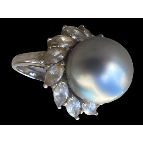 247 - A SILVER CZ & PEARL STYLE COCKTAIL RING