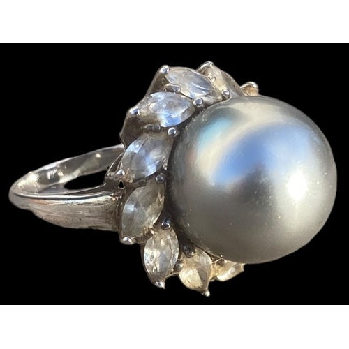 247 - A SILVER CZ & PEARL STYLE COCKTAIL RING