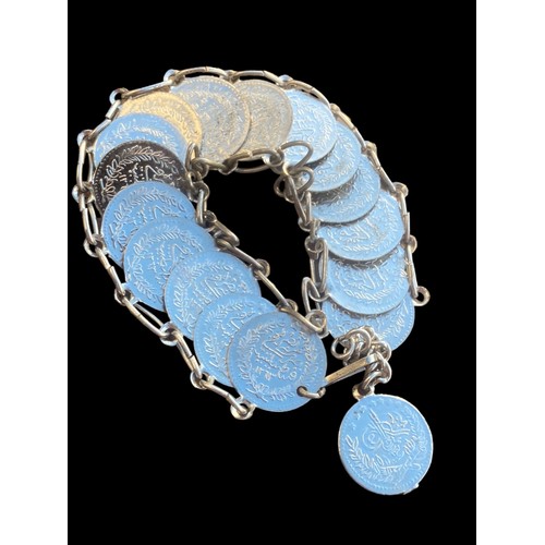 254 - A COIN BRACELET