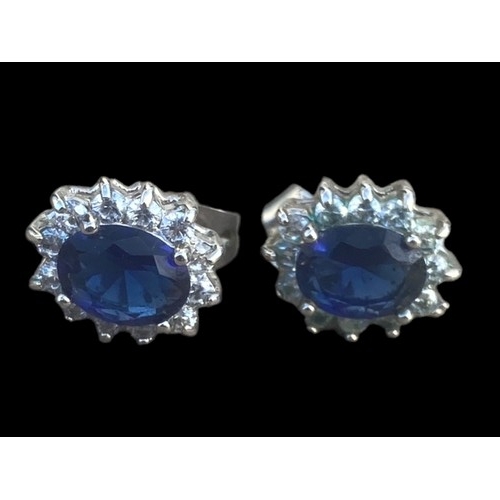 268 - A PAIR OF BLUE AND CRYSTAL SET CLUSTER EARRINGS