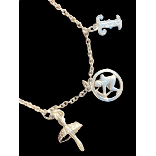 272 - A SILVER CHARM BRACELET WITH CHARMS