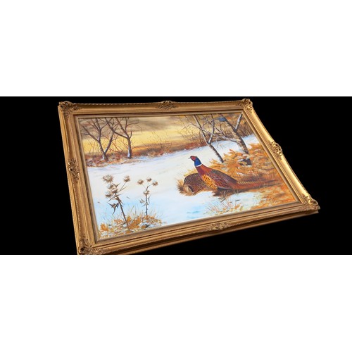 325 - A GILT FRAMED PHEASANT OIL ON CANVAS SIGNED