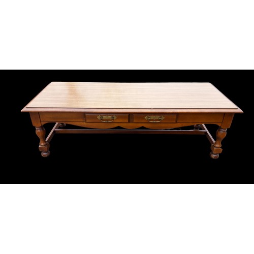 285 - A MAHOGANY COFFEE TABLE