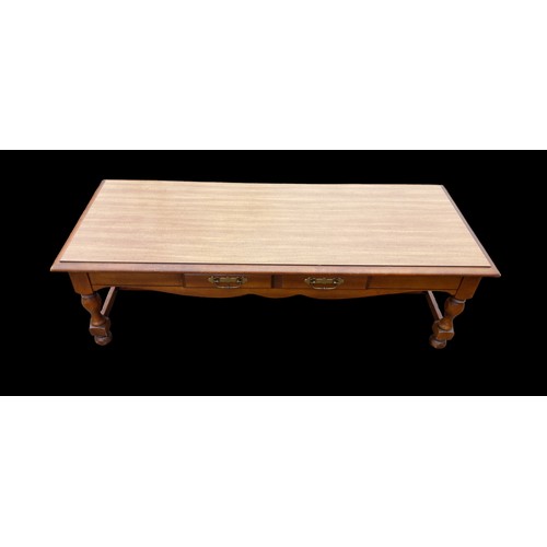 285 - A MAHOGANY COFFEE TABLE