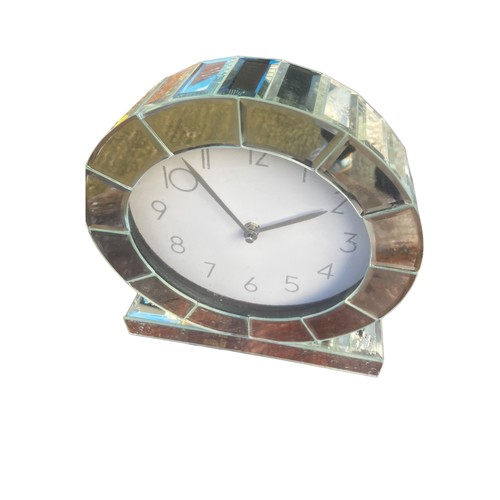 296 - A ODERN MIRROR CLOCK