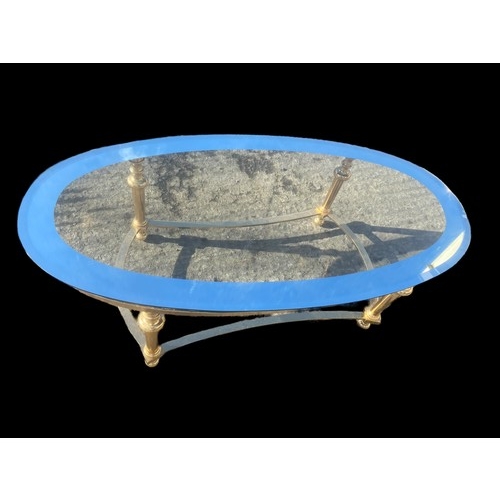 306 - A DESIGNER ORNATE HEAVY BRASS BASED COFFEE TABLE WITH A MIRROR GLASS TOP