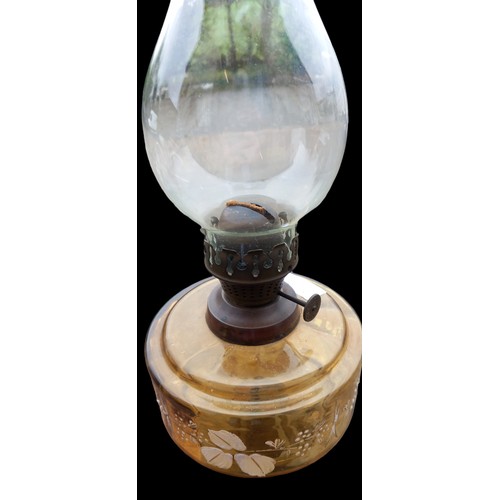 349 - AN ANTIQUE CAST BASE OIL LAMP WITH A PRETTY HANDPAINTED GLASS BOWL