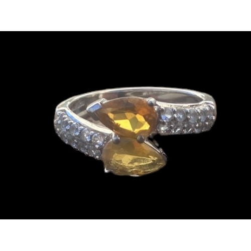 392 - A SILVER GEMSET CITREAN  AND  TOPAZ RING