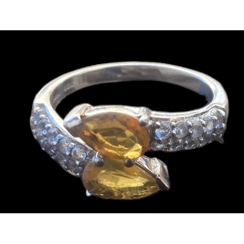 392 - A SILVER GEMSET CITREAN  AND  TOPAZ RING