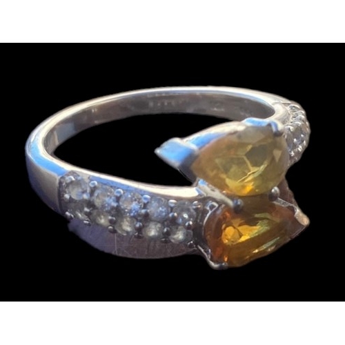 392 - A SILVER GEMSET CITREAN  AND  TOPAZ RING