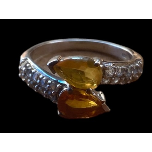 392 - A SILVER GEMSET CITREAN  AND  TOPAZ RING