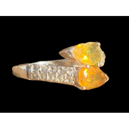 392 - A SILVER GEMSET CITREAN  AND  TOPAZ RING