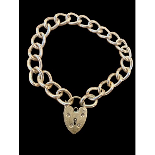 430 - A CURB LINK BRACELET WITH HEART PADLOCK CATCH