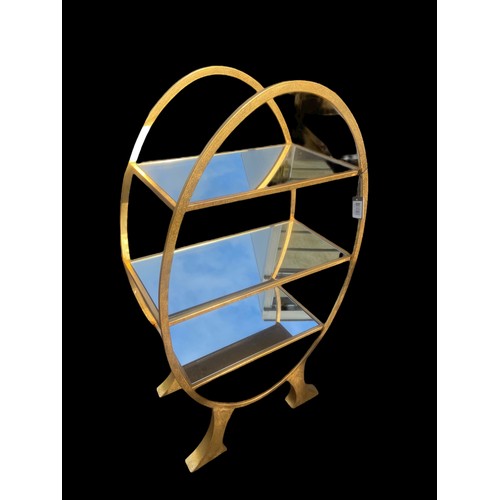 460 - A NEW 3 TIER GILT OVAL SHELVING UNIT WITH MIRRORED SHELVES