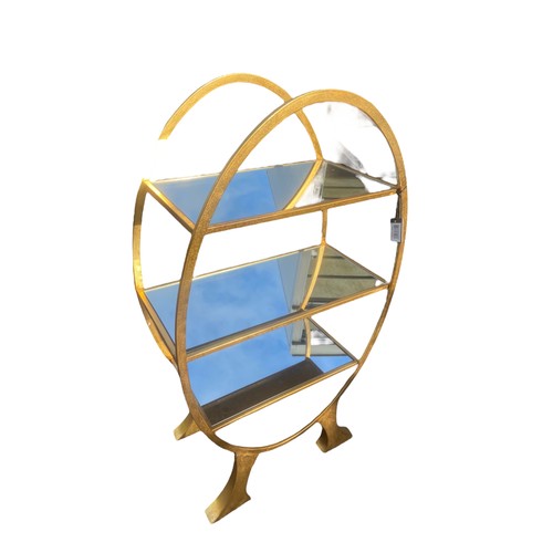 460 - A NEW 3 TIER GILT OVAL SHELVING UNIT WITH MIRRORED SHELVES