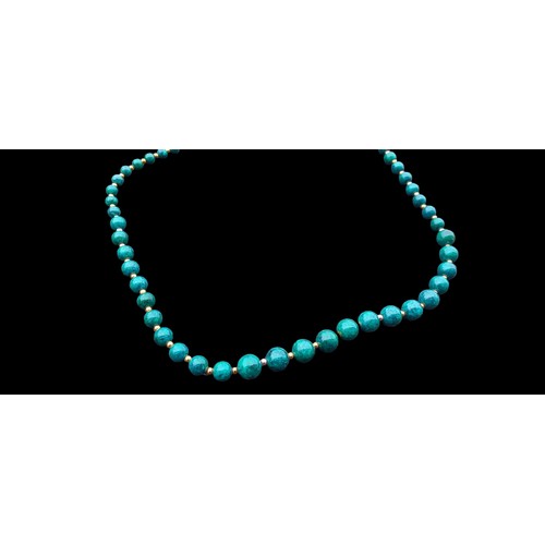 393 - A BEAUTIFUL MALACHITE NECKLACE WITH GOLD COLOURED BALL SPACERS