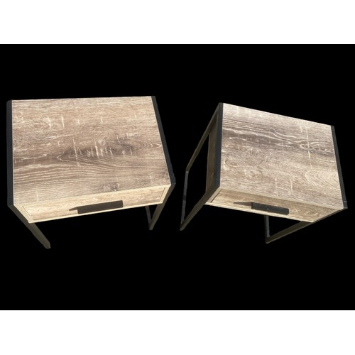 463 - A PAIR OF WASHED EFFECT SIDE TABLES WITH BLACK METAL FRAMES