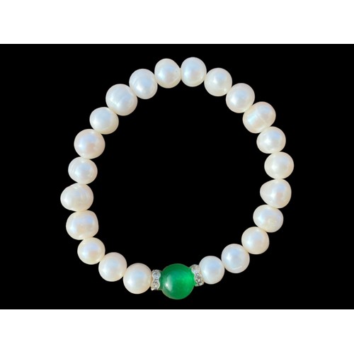 630 - A GENIUNE PEARL BRACELET SET WITH JADE STYLE BEAD