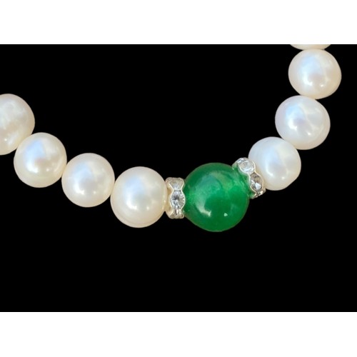 630 - A GENIUNE PEARL BRACELET SET WITH JADE STYLE BEAD