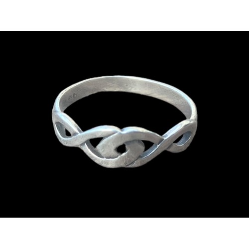 633 - A SILVER CELTIC DESIGN RING