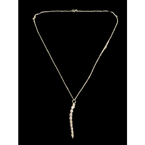 634 - A 9CT GOLD DROP DESINGER CRYSTAL PENDANT ON A 9CT CHAIN