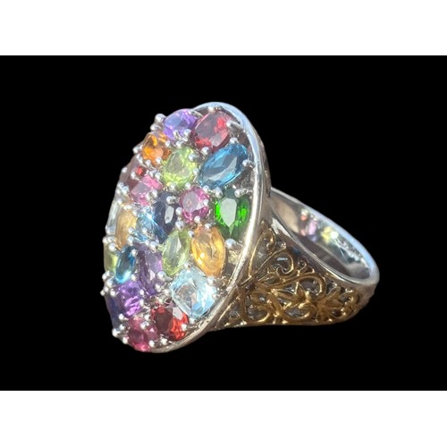 635 - A DESIGNER MULTI GEM STONE RING