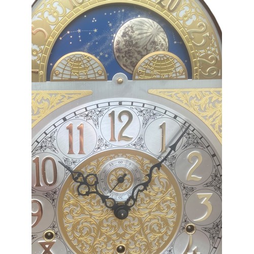 644 - A MODERN TRIPLE WEIGHT MAHOGANY CASED GRANDFATHER CLOCK WITH MOVING FACE