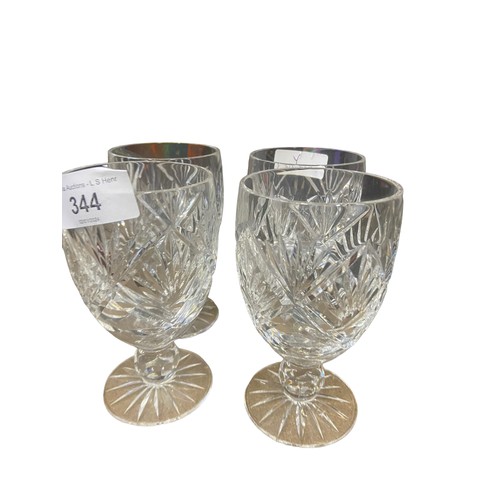 650 - A SET OF 4 STEMMED TUMBLERS BY TYRONE CRYSTAL