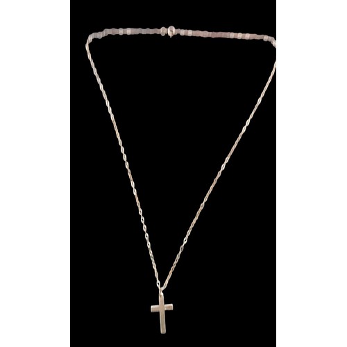 494 - A 9CT GOLD CROSS ON A 9CT GOLD CHAIN