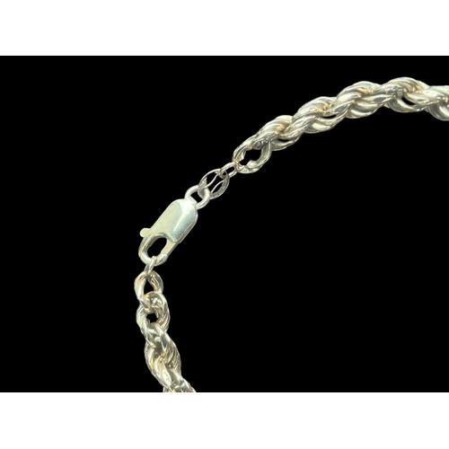 495 - A 9CT GOLD THICK ROPE DESIGN BRACELET