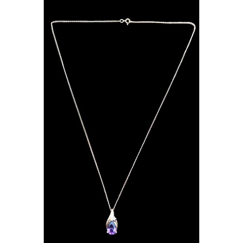 512 - A 14CT GOLD AMETHYST SET PENDANT ON A 14CT GOLD CHAIN