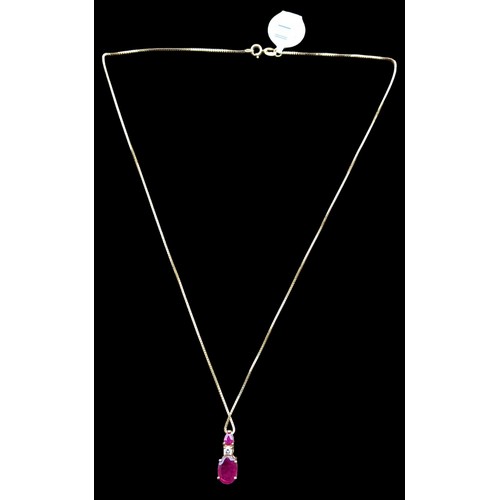 521 - A 14CT GOLD RUBY PENDANT (1.04CT OF RUBY) ON A 14CT GOLD CHAIN