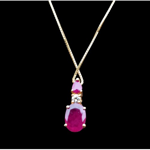 521 - A 14CT GOLD RUBY PENDANT (1.04CT OF RUBY) ON A 14CT GOLD CHAIN