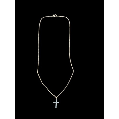 527 - AN ORNATE 9CT GOLD CROSS ON A 9CT GOLD CHAIN