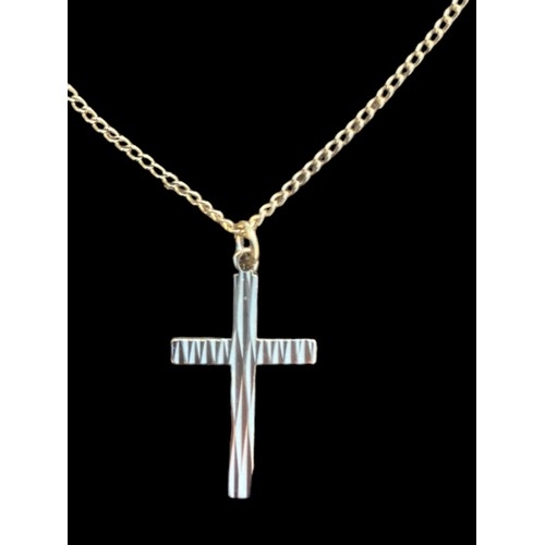 527 - AN ORNATE 9CT GOLD CROSS ON A 9CT GOLD CHAIN